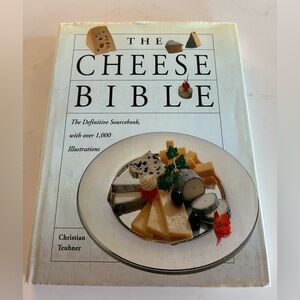 Explore the world of cheese with 'The Cheese Bible' by Christian Teubner.